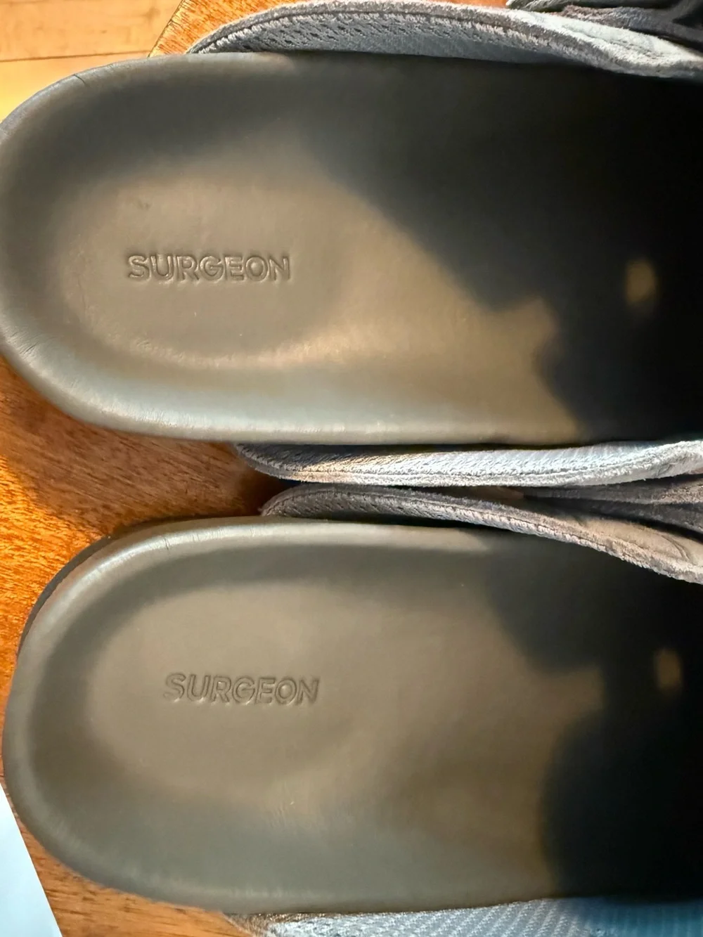 Men's SRGN mule in grey by The Surgeon with skull and crossbones pattern.